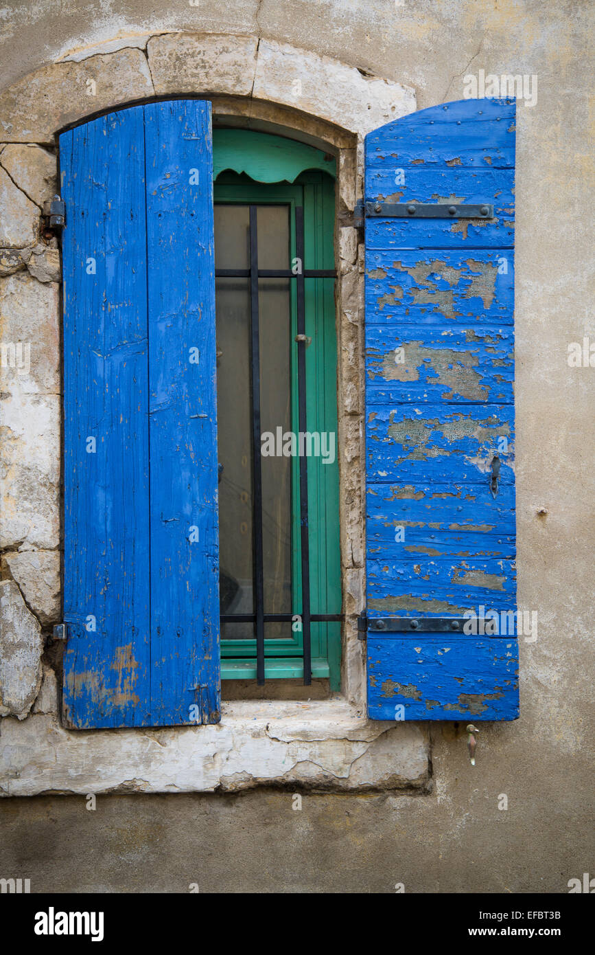Blue window shutters, Arles, France Stock Photo