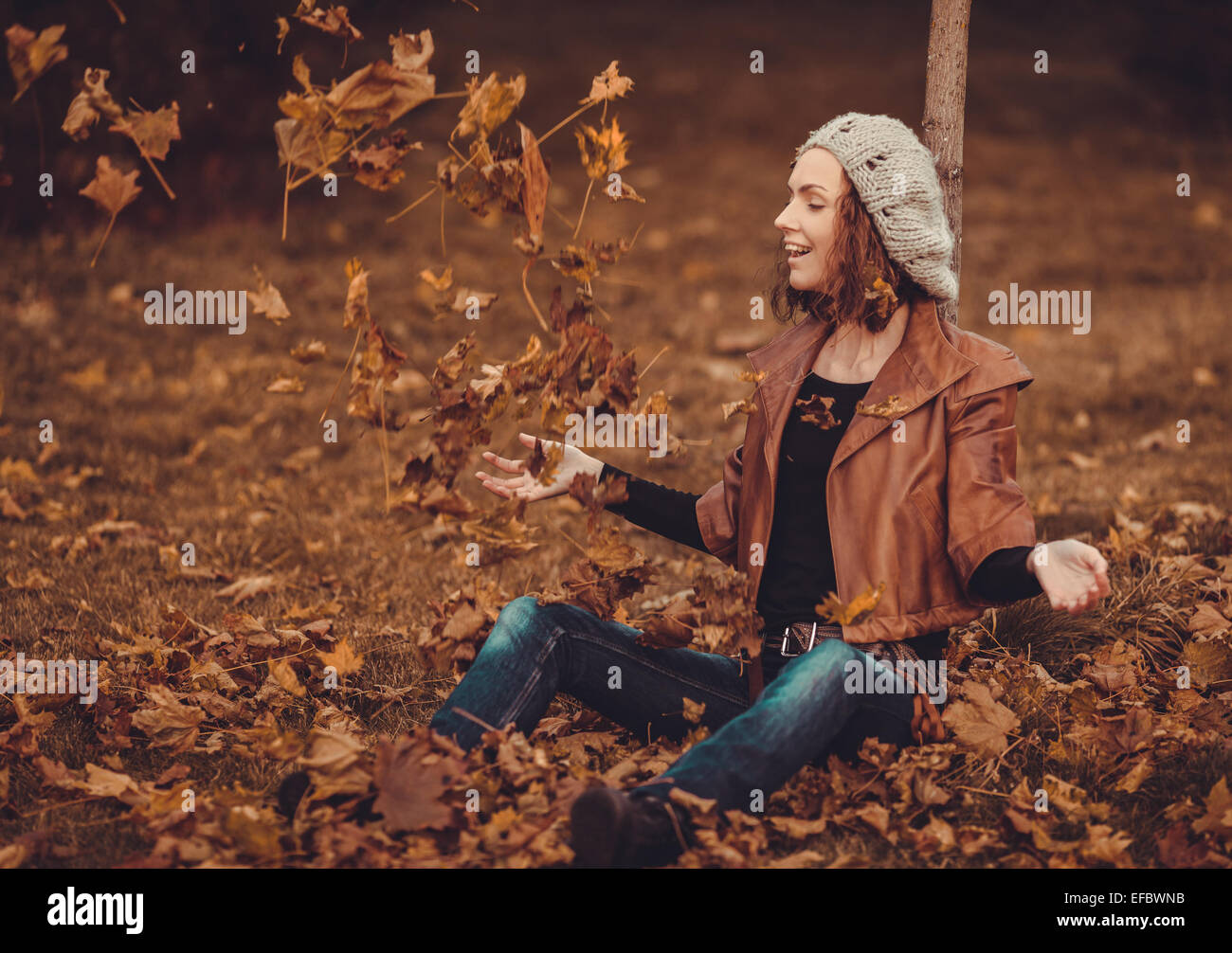 young girl in autumn park Stock Photo - Alamy