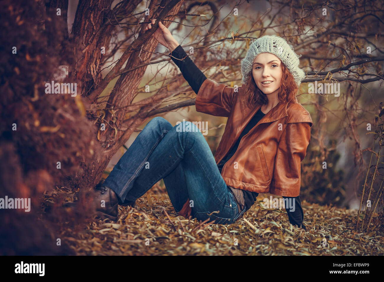 young girl in autumn park Stock Photo - Alamy