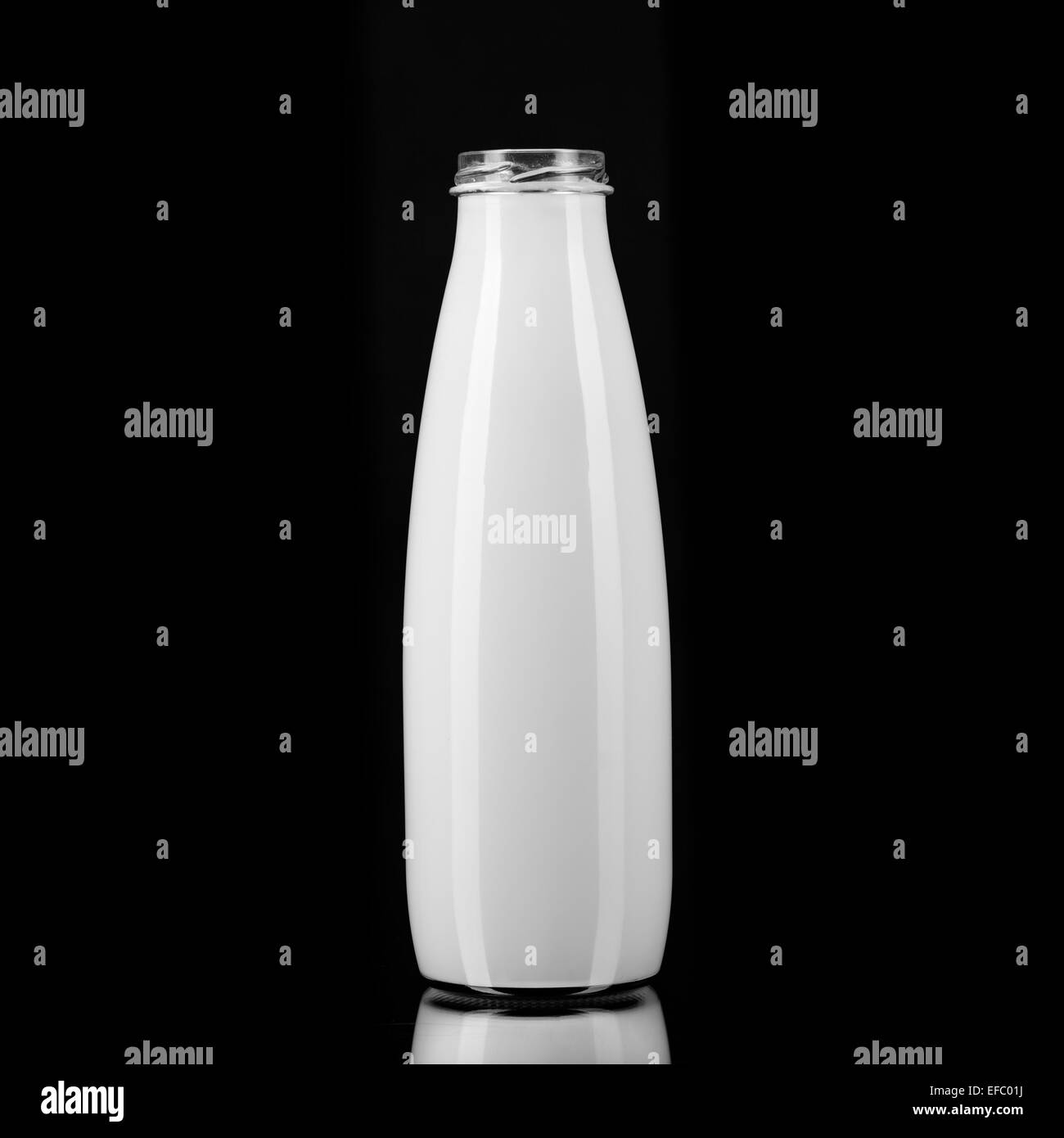 Bottle of milk on black Stock Photo