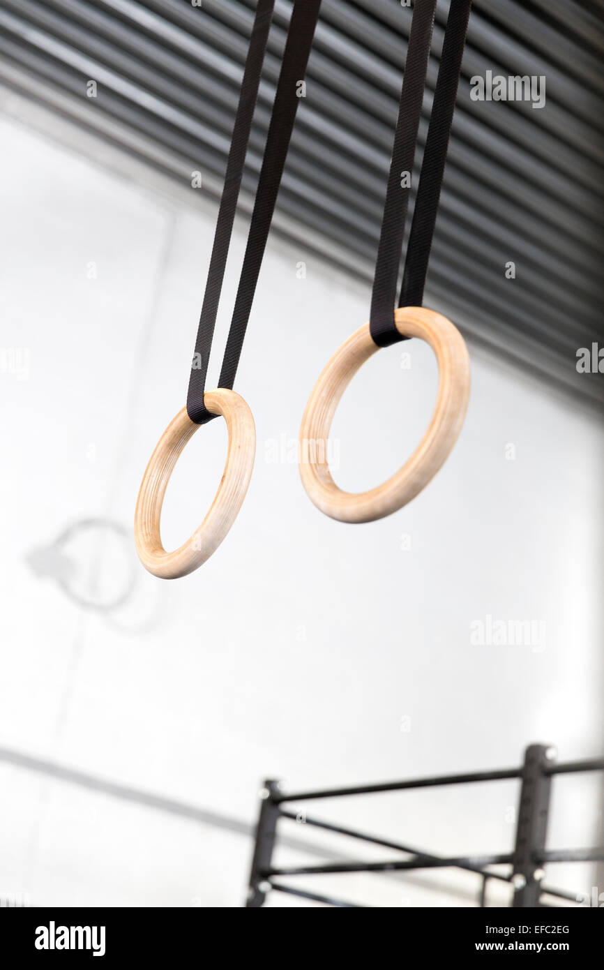 Two gymnast workout rings in fitness gym center Stock Photo Alamy