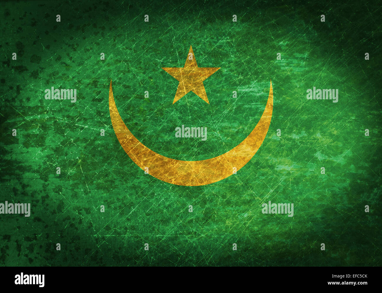 Old rusty metal sign with a flag - Mauritania Stock Photo