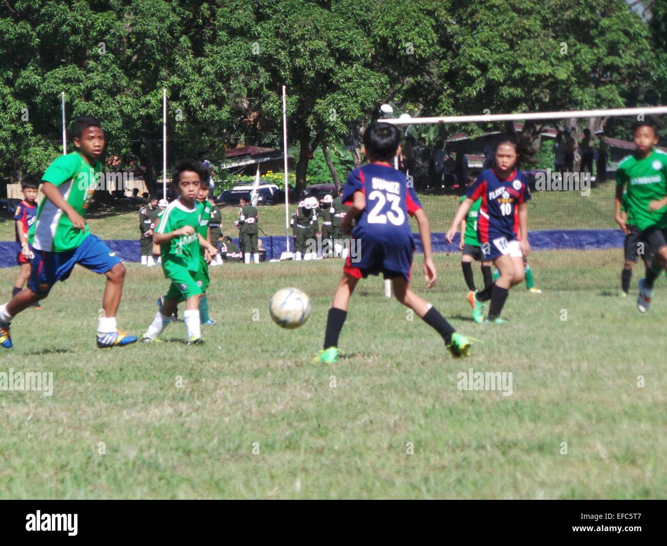 Taguig City, Philippines. 31th January, 2015. Around 700 kids, teens and adults from 54 various football teams and advocacy group (composing of football clubs from orphanages and schools) joins the annual 4th Commandant's Football Cup held at Marine Barracks in Taguig City. The football event is prelude to the big event dubbed as “Football for Peace” on April in which kids from conflict areas in Mindanao such as Basilan, Sulu and Tawi-Tawi are joined together to promote peace and not war. Credit:  Sherbien Dacalanio/Alamy Live News Stock Photo