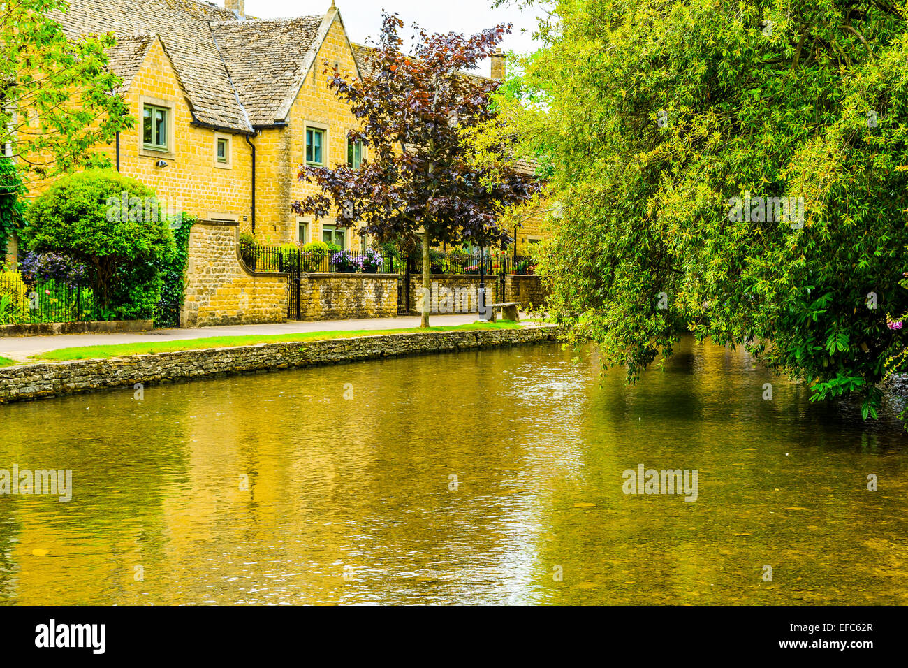 The River Windrush running through Bourton on the Water in The Cotswolds, Gloucestershire, UK. Stock Photo