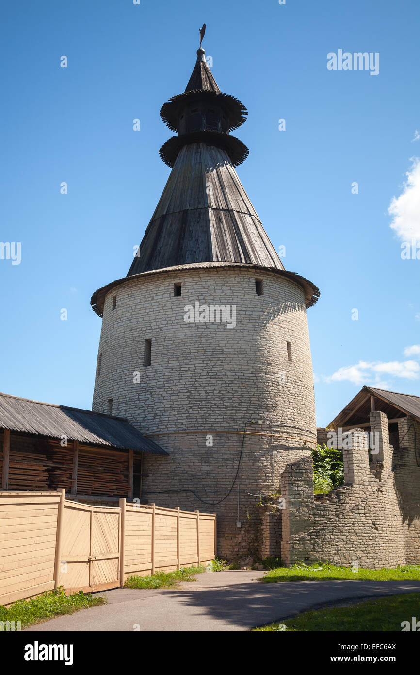 Classical Russian ancient architecture. Stone tower with wooden roofs of old fortress. Kremlin of Pskov, Russia Stock Photo