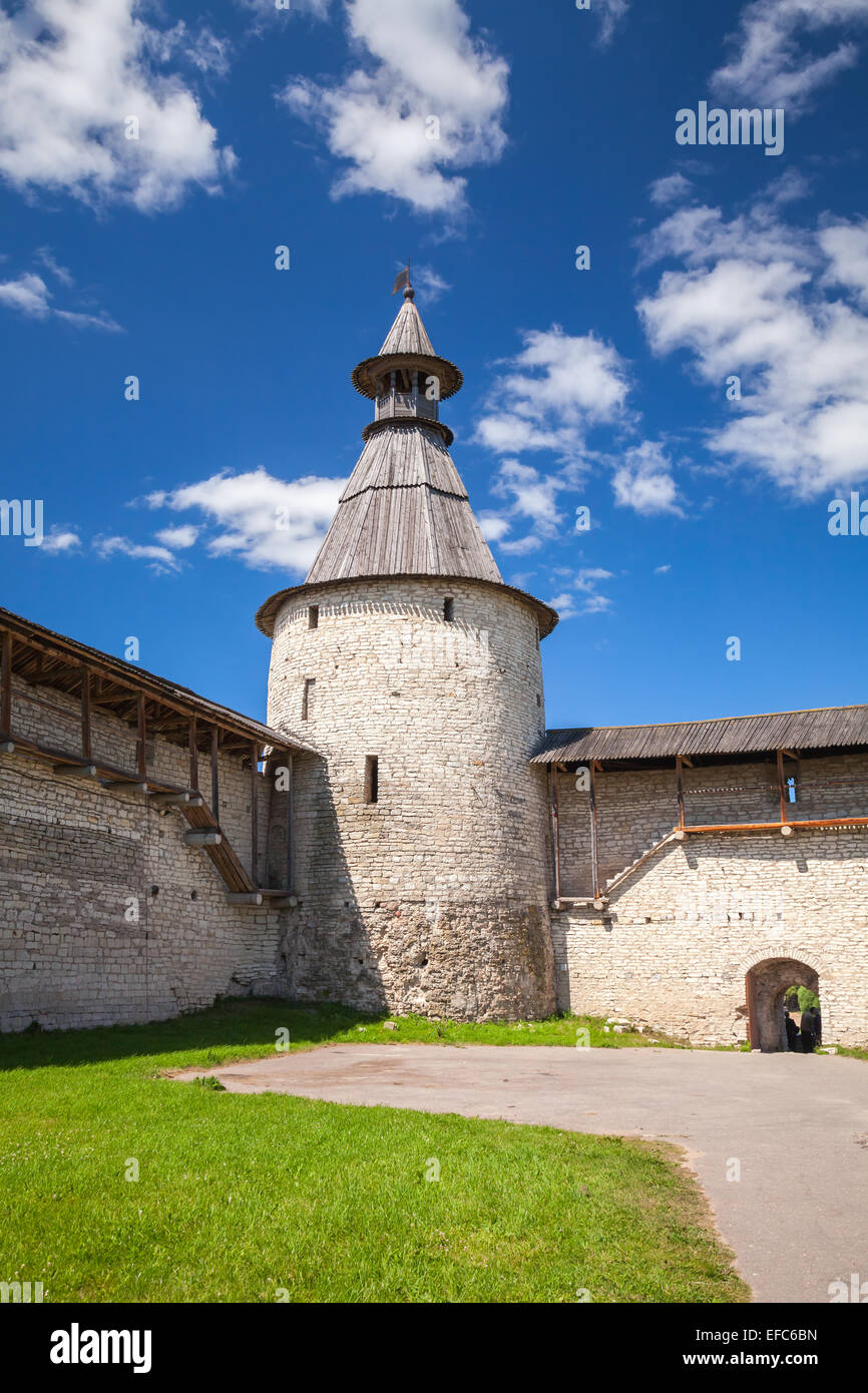Classical Russian ancient architecture. Stone tower and walls of old fortress. Kremlin of Pskov, Russia Stock Photo