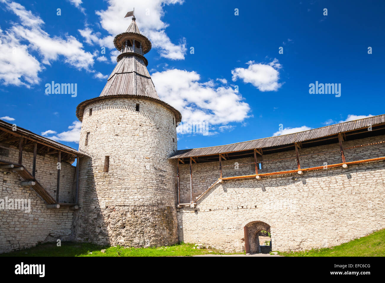 Stone tower and walls of old fortress. Kremlin of Pskov, Russia. Classical Russian ancient architecture Stock Photo
