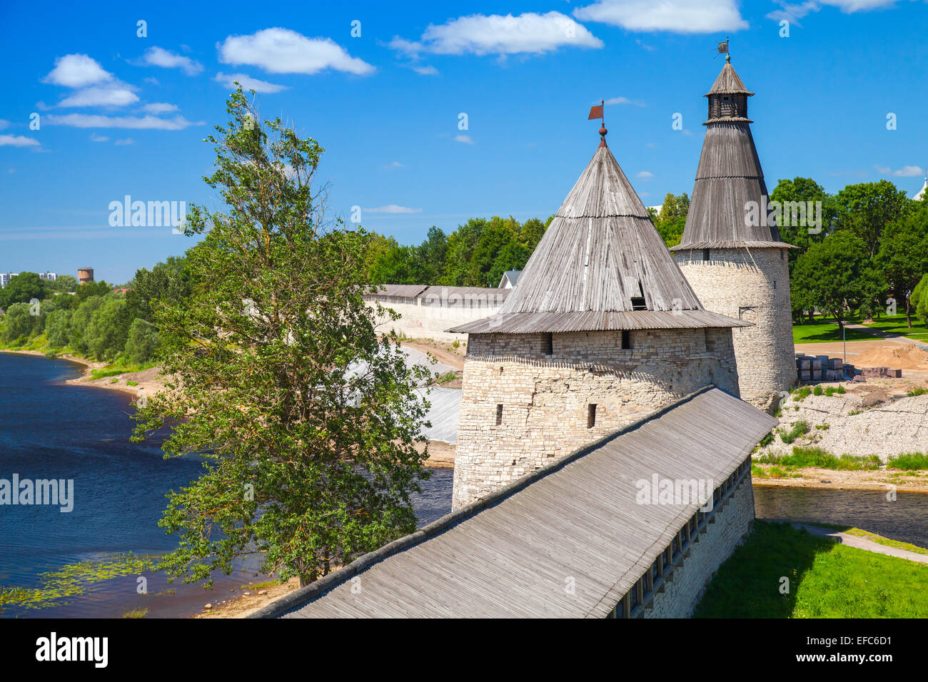 Stone towers and wall of old fortress. Kremlin of Pskov, Russia. Classical Russian ancient architecture Stock Photo