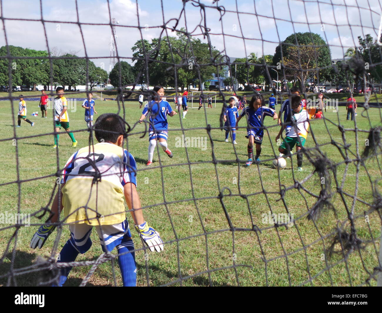 Taguig City, Philippines. 31th January, 2015. Around 700 kids, teens and adults from 54 various football teams and advocacy group (composing of football clubs from orphanages and schools) joins the annual 4th Commandant’s Football Cup held at Marine Barracks in Taguig City. The football event is prelude to the big event dubbed as “Football for Peace” on April in which kids from conflict areas in Mindanao such as Basilan, Sulu and Tawi-Tawi are joined together to promote peace and not war. “Football for Peace” is an advocacy program of the Philippine Marines to remove the stigma of war among ki Stock Photo