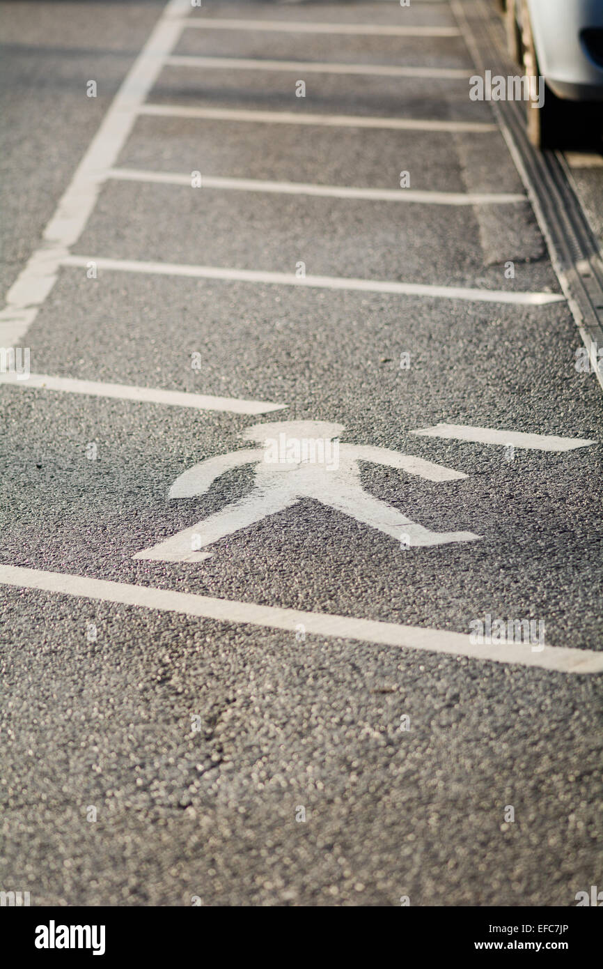 Pedestrian walkway in car park Stock Photo