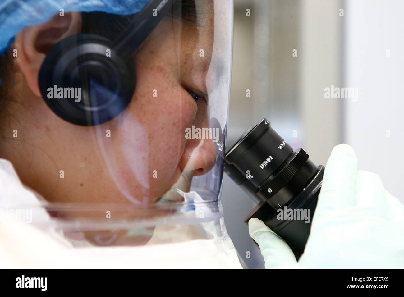 Wuhan, China's Hubei Province. 30th Jan, 2015. A researcher takes part in a drill at the newly-completed lab in Wuhan, capital of central China's Hubei Province, Jan. 30, 2015. China completed its first high level biosafety laboratory based in Wuhan Saturday in Wuhan after more than a decade of construction. The lab will be used to study class four pathogens (P4), which refers to the most virulent viruses that pose a high risk of aerosol-transmitted person-to-person infections. © Yin Gang/Xinhua/Alamy Live News Stock Photo