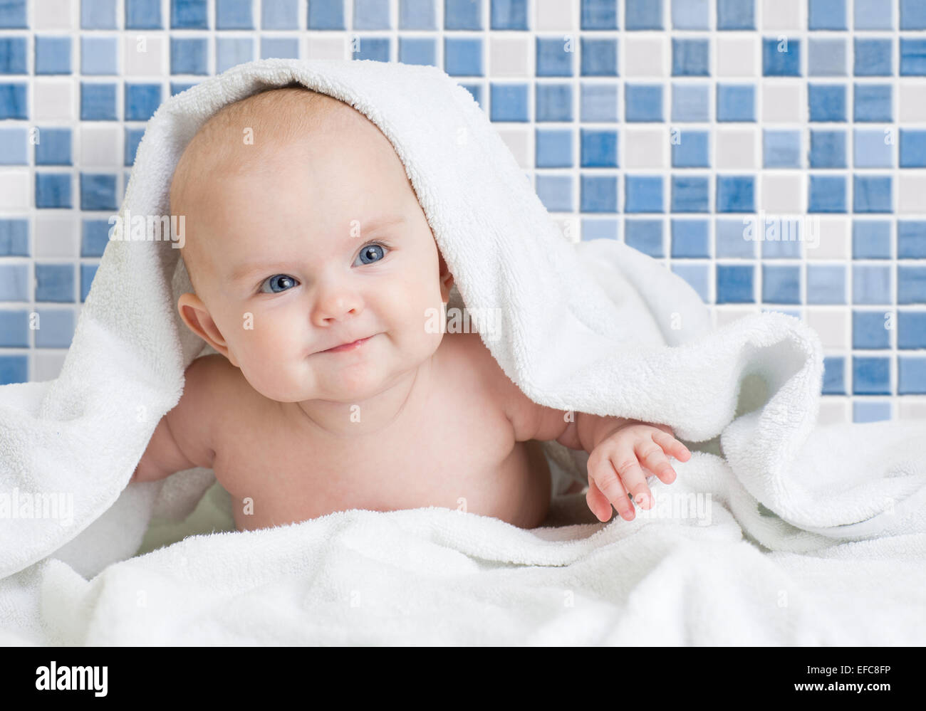 Cute smiling baby kid after bathing in bathroom Stock Photo Alamy