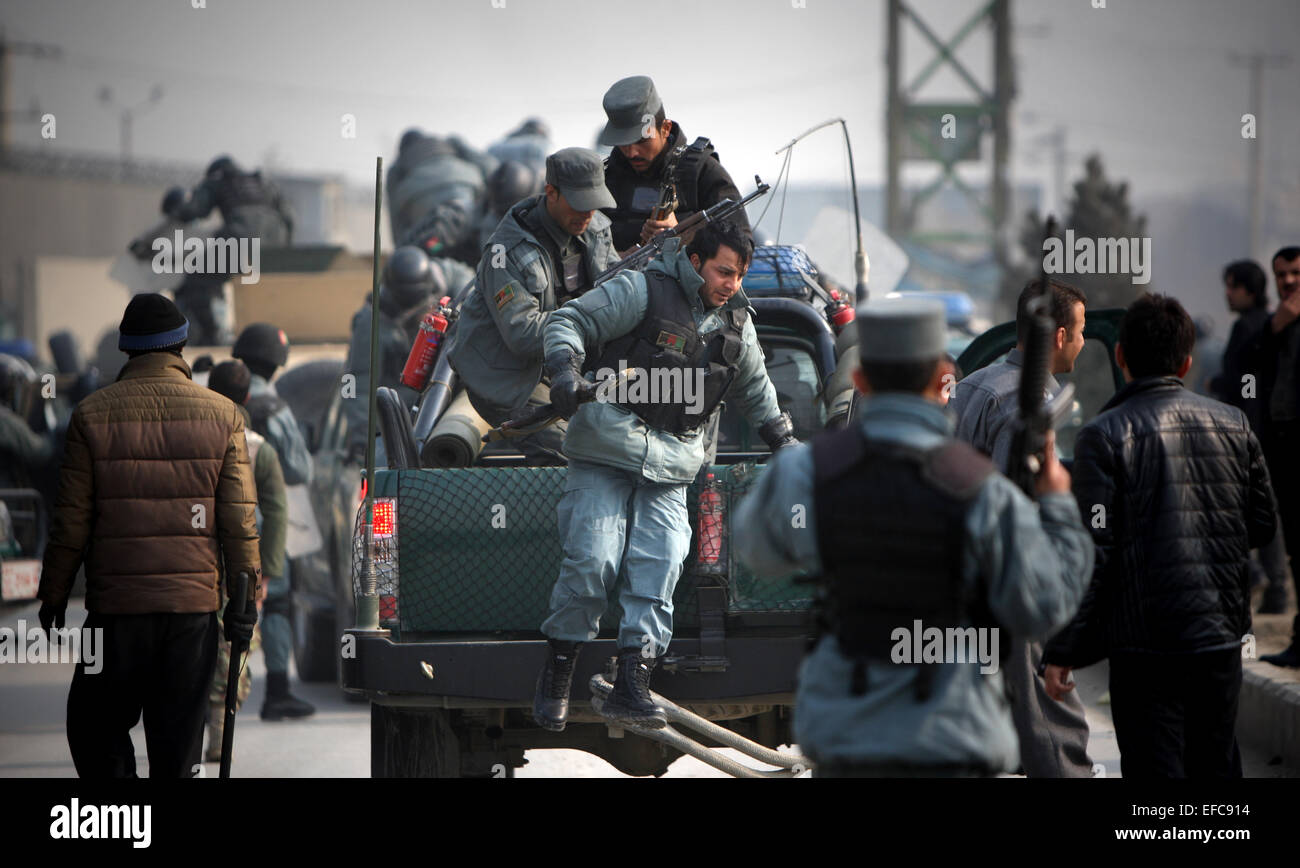 Kabul, Afghanistan. 31st Jan, 2015. Afghan policemen arrive during an angry protest against caricatures published in French magazine Charlie Hebdo in Kabul, Afghanistan on Jan. 31, 2015. At least five people were wounded as a demonstration to protest publishing Muslims' prophet caricature by French Charlie Hebdo magazine turned violent in eastern Kabul. Credit:  Ahmad Massoud/Xinhua/Alamy Live News Stock Photo