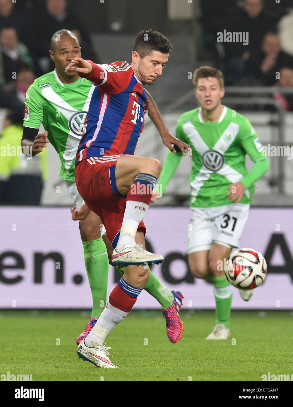 Wolfsburg, Germany. 30th Jan, 2015. Munich's Robert Lewandowski and ...