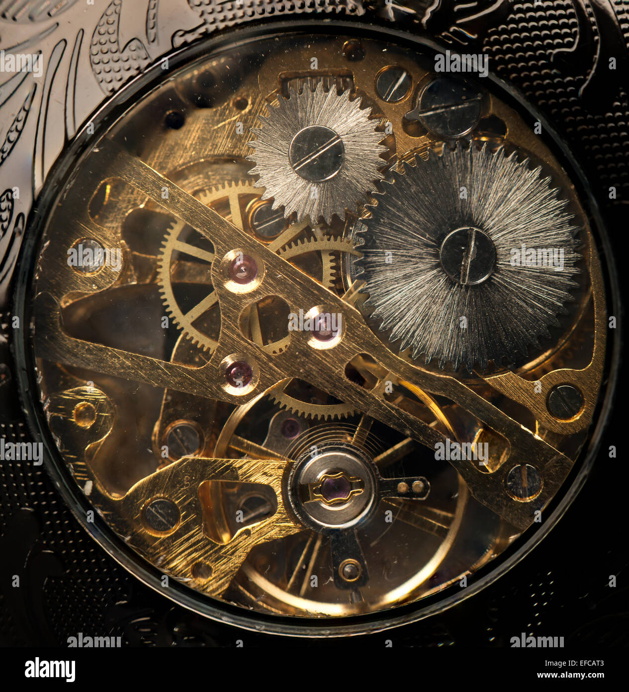 Macro Close up of the inner workings of a pocket watch, steampunk Stock Photo