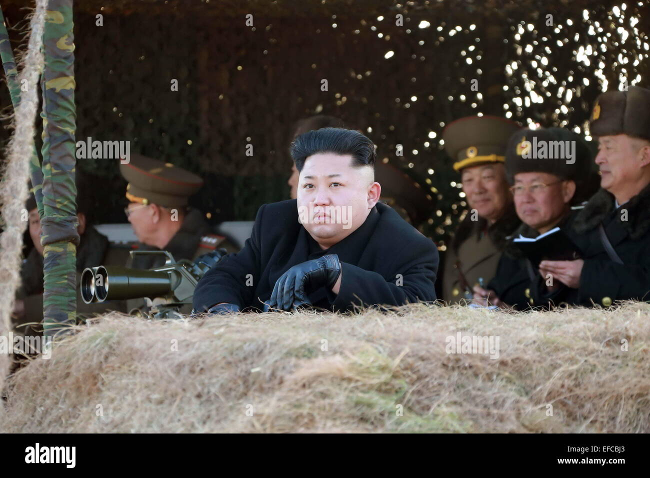 Pyongyang, DPRK. 31st Jan, 2015. Photo provided by Korean Central News Agency (KCNA) on Jan. 31, 2015 shows top leader of the Democratic People's Republic of Korea (DPRK) Kim Jong Un (front) inspecting a drill of the Korean People's Army (KPA). The fighter airmen and combined submarine units successively carried out the drill. Kim Jong Un gave instructions for bolstering up the operation capabilities of the units of all services. He said that the DPRK is ready to counter any war including a war by conventional armed forces or a nuclear war. Credit:  Xinhua/Alamy Live News Stock Photo