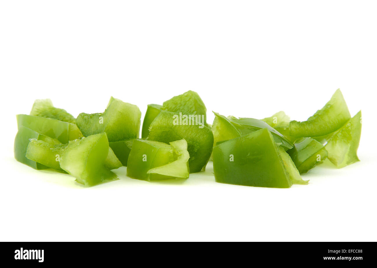 Chopped green pepper on a white background Stock Photo - Alamy