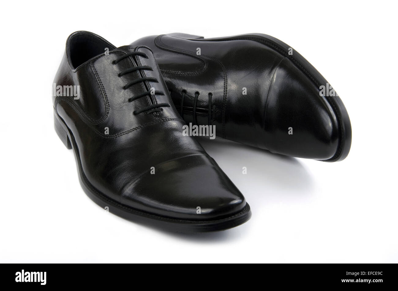Pair of black leather mens shoes isolated on a white background Stock ...