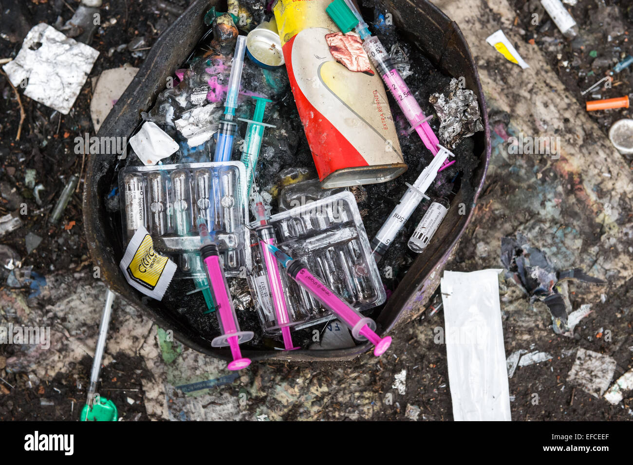 Discarded hypodermic needles used by heroin addicts Stock Photo