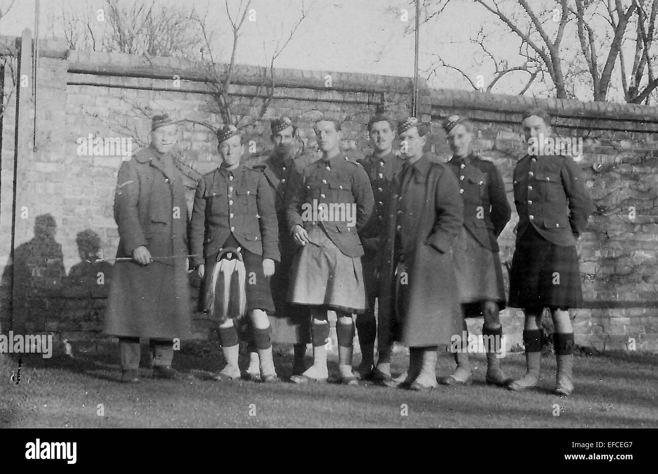 Aberdeen University's U Company, 4th Gordon Highlanders, 1914, Bedford.  Members in field uniforms with great coats and kilt aprons. Stock Photo