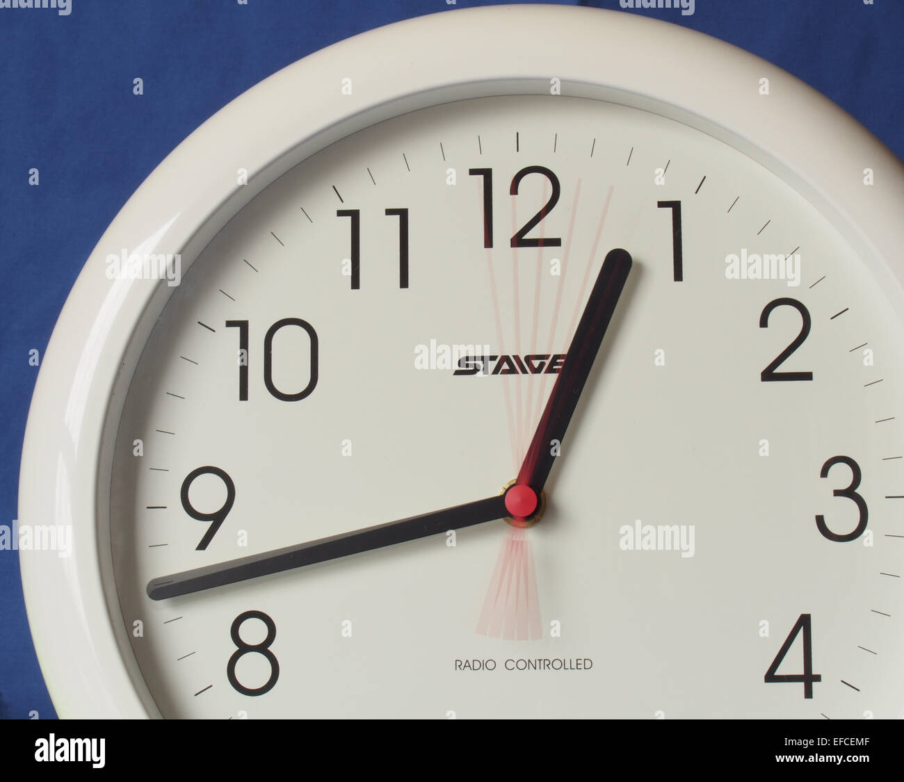 two thirds of a radio controlled wall clock face showing movement of