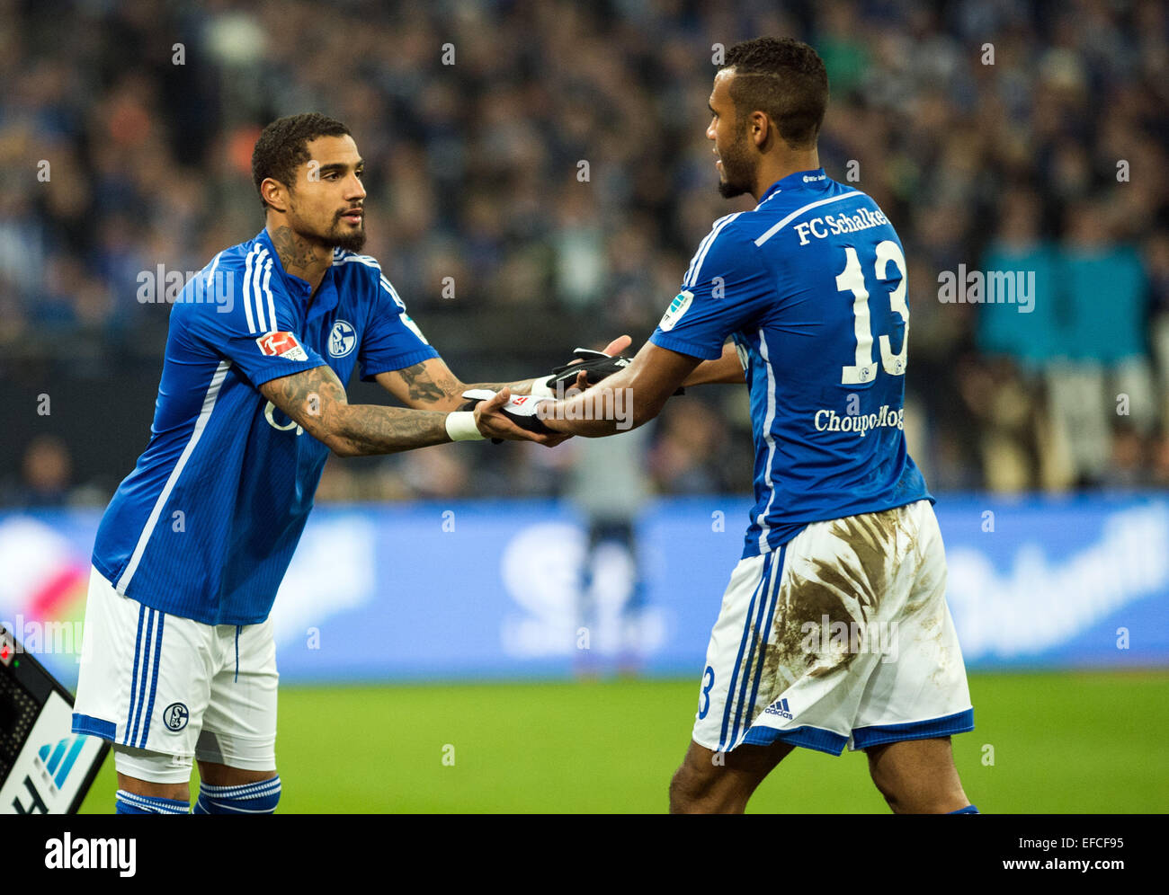 Gelsenkirchen, Germany. 31st Jan, 2015. Schalke's Kevin-Prince Boateng (L) and Eric Maxim Choupo-Moting gesture during the German Bundesliga soccer match FC Schalke 04 vs Hannover 96 at the Veltins-Arena in Gelsenkirchen, Germany, 31 January 2015. PHOTO: BERND THISSEN/dpa (ATTENTION: Due to the accreditation guidelines, the DFL only permits the publication and utilisation of up to 15 pictures per match on the internet and in online media during the match.) Credit:  dpa/Alamy Live News Stock Photo