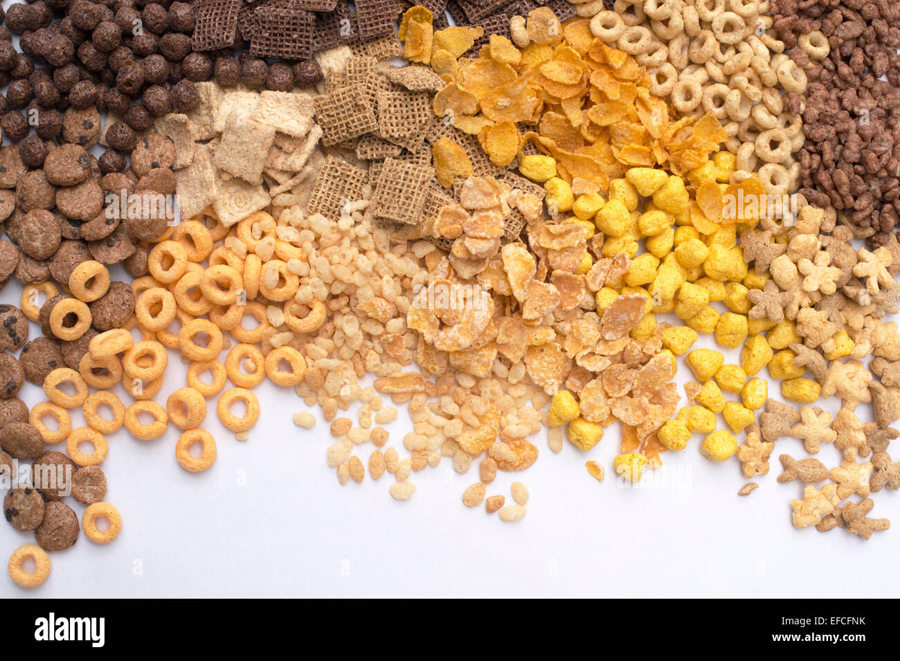 Assorted childrens breakfast cereals on white background Stock Photo