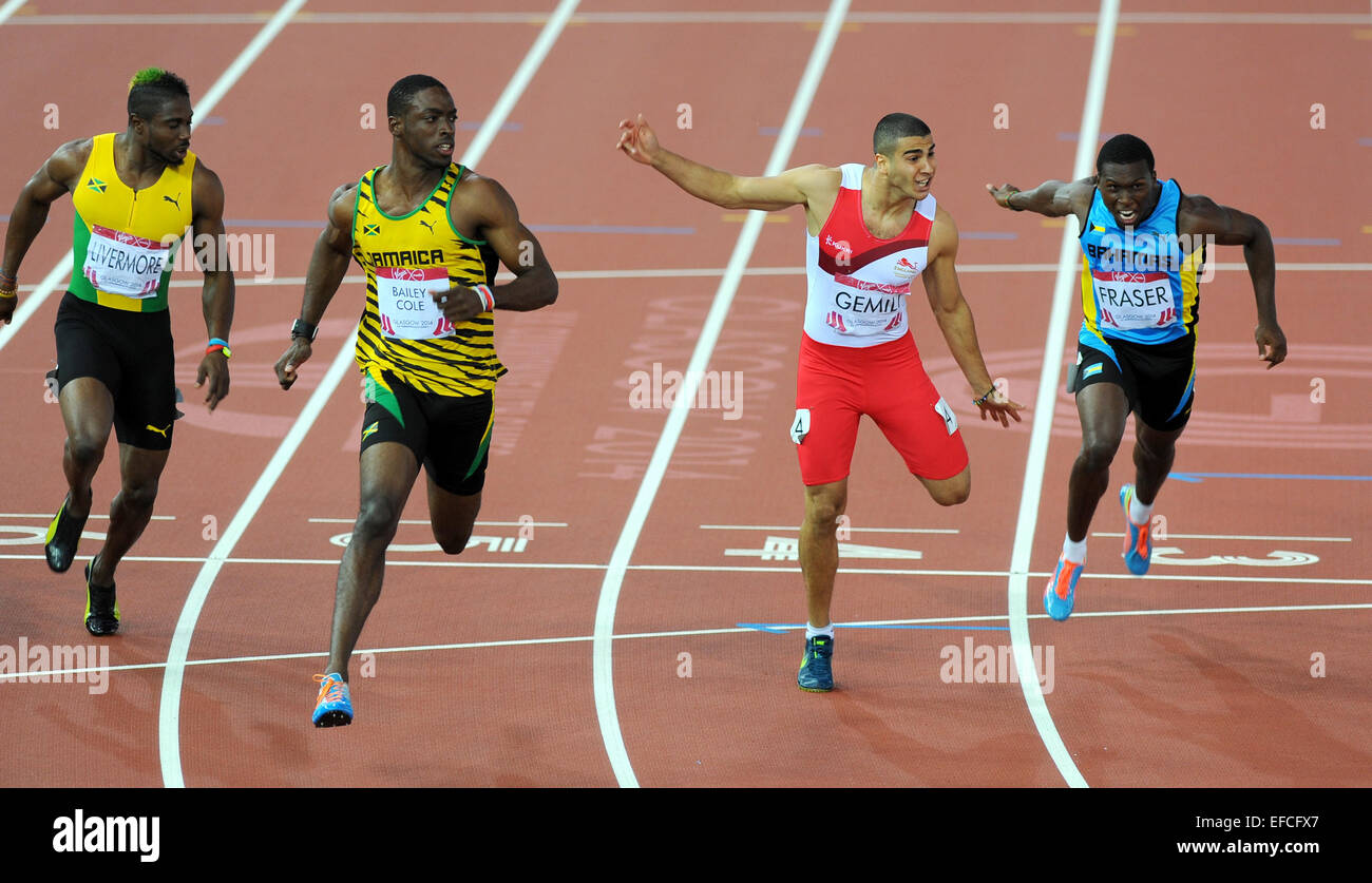 Jamaica's Kemar Bailey-Cole takes Commonwealth Games gold in the 100 metres final ahead of England's Adam Gemili at the Commonwealth Games, Glasgow, Scotland  Featuring: Kemar Bailey-Cole,Adam Gemili Where: Glasgow, United Kingdom When: 28 Jul 2014 Stock Photo