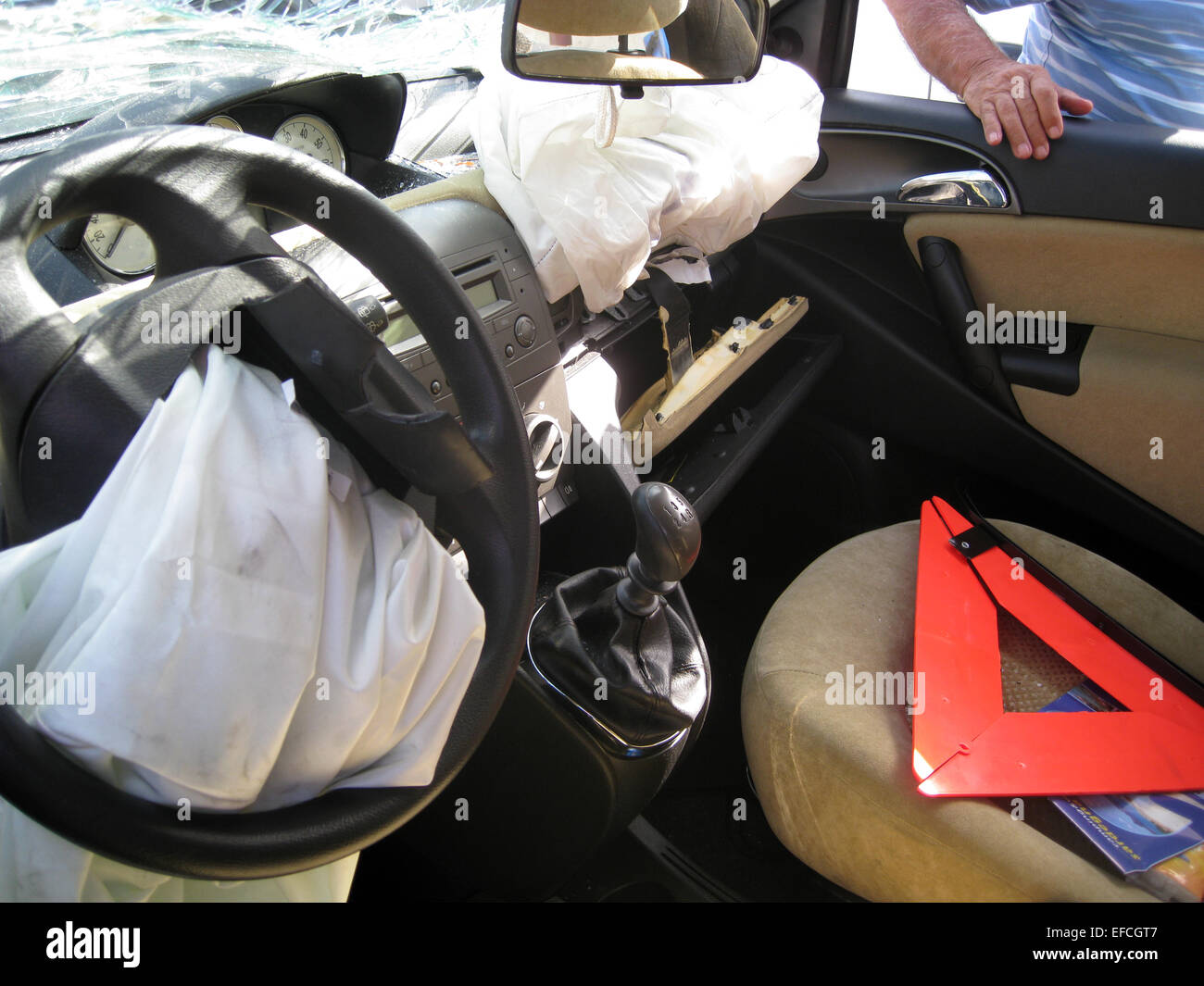 car internal drive crashed with broken windshield, rearview mirror