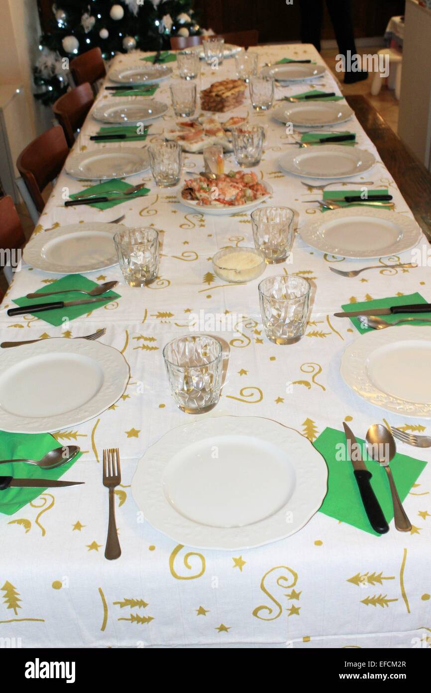 table set for the Christmas dinner Stock Photo - Alamy