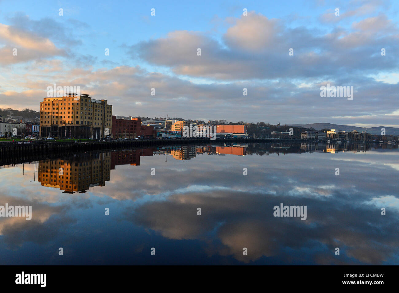 Waterfront buildings reflection on River Foyle, Londonderry (Derry