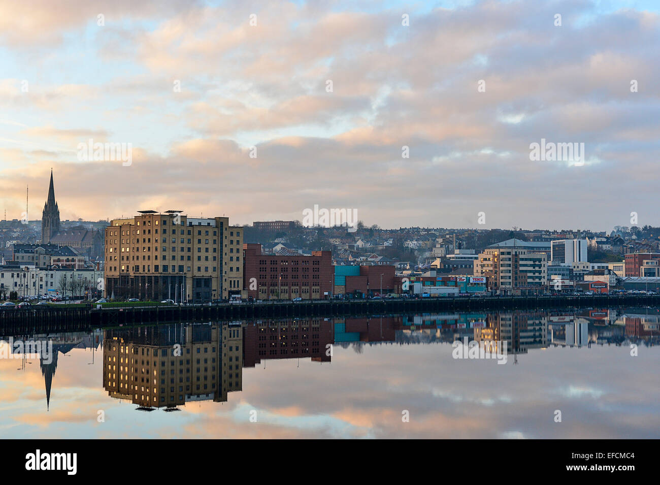 Waterfront buildings reflection on River Foyle, Londonderry (Derry) Northern Ireland Stock Photo