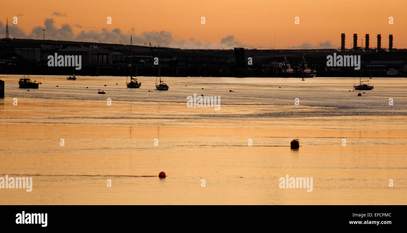 The tidal Cleddau estuary opposite Pembroke, Wales is bridged to the