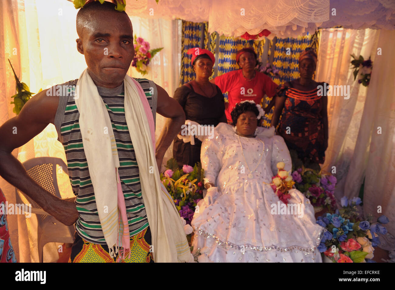 Family and friends with the deceased at a traditional Lake Volta region funeral service. Stock Photo