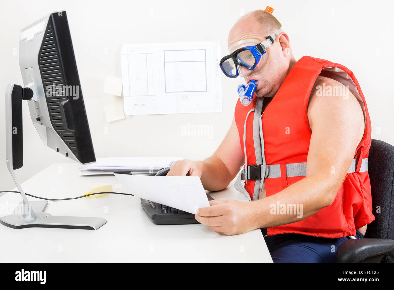Strange businessman in diving mask and snorkel Stock Photo