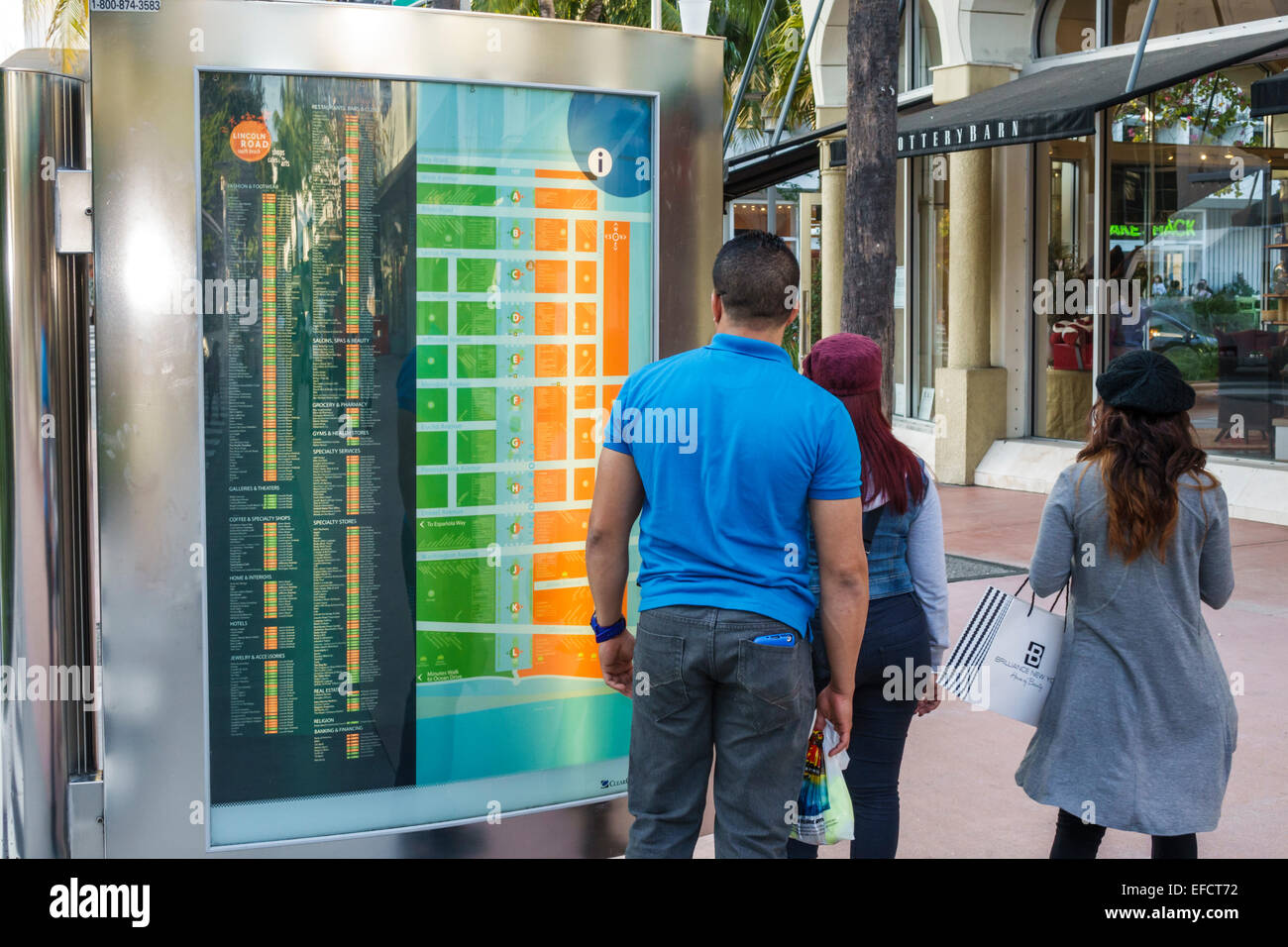 Man watching women in store hi-res stock photography and images - Alamy