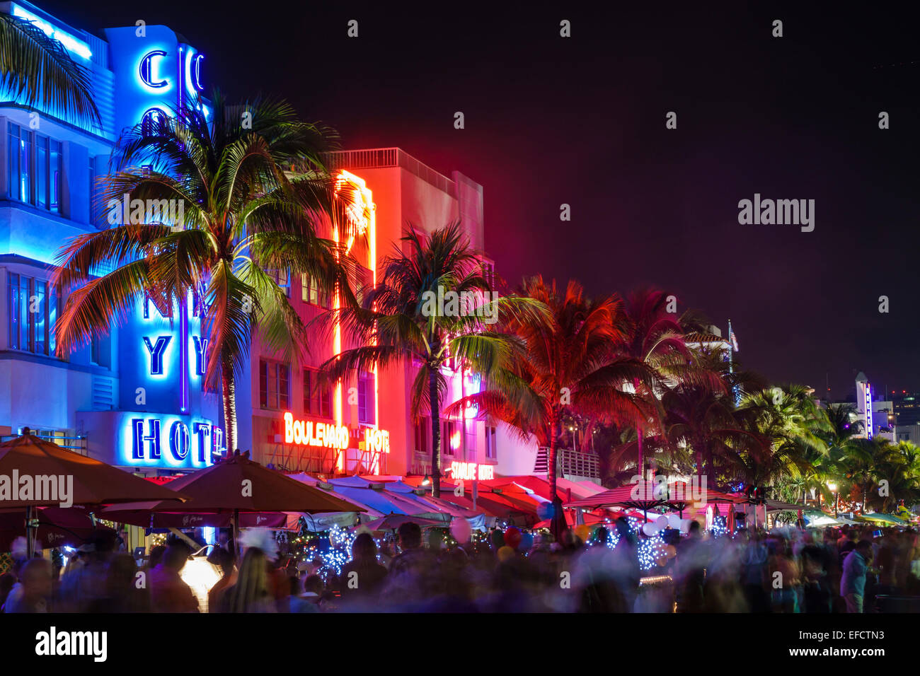 Miami Beach Florida,Ocean Drive,New Year's Eve,night evening,Colony,hotel,Boulevard,neon sign,FL150101021 Stock Photo