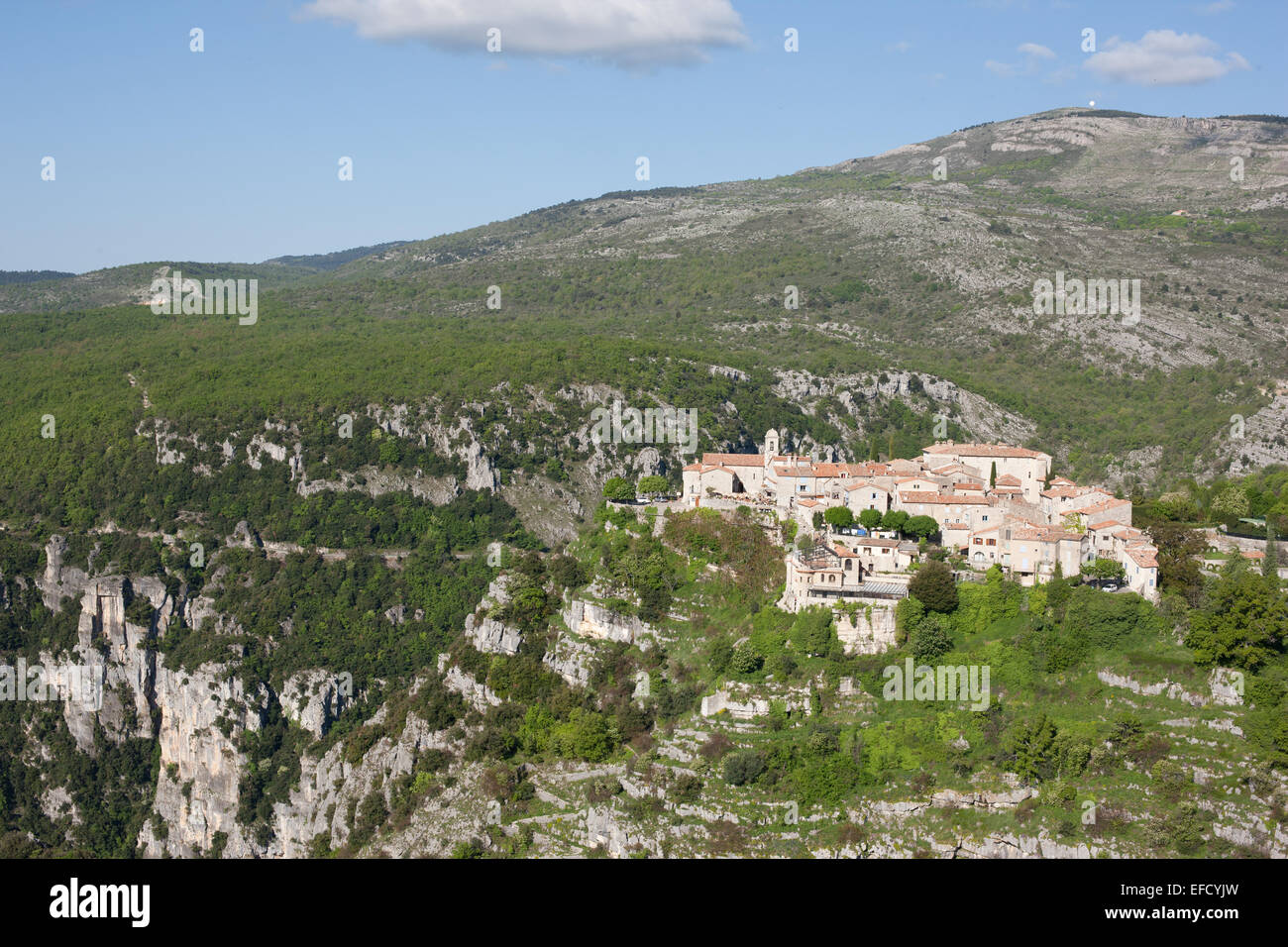 AERIAL VIEW. Perched medieval village. Gourdon, Alpes-Maritimes, French Riviera, France. Stock Photo