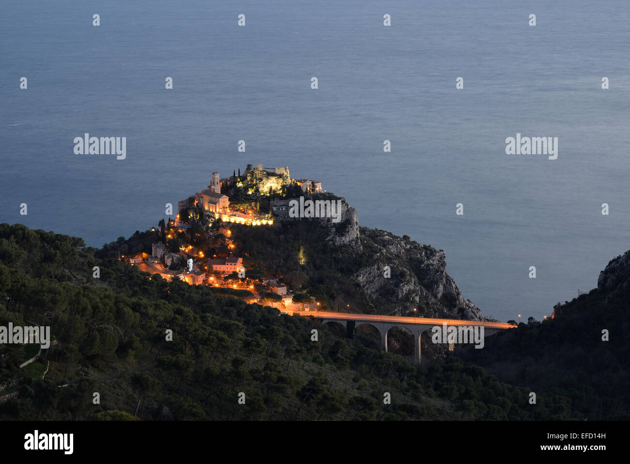 Perched medieval village overlooking the Mediterranean Sea at twilight. Èze-Village, Alpes-Maritimes, French Riviera, France. Stock Photo