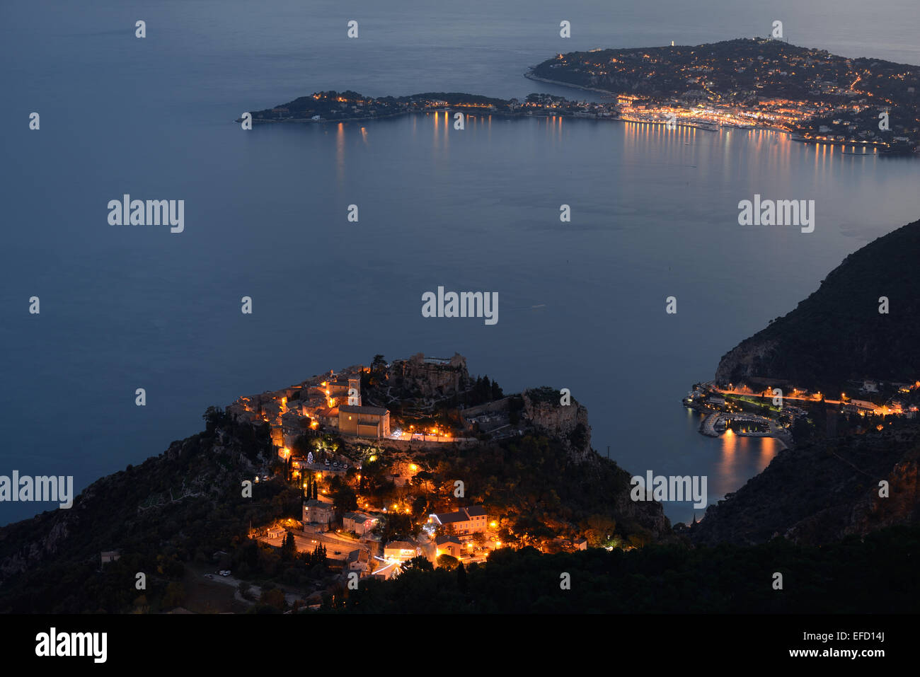 Hilltop village of Èze (427m asl) overlooking the Mediterranean and Saint-Jean-Cap-Ferrat in the distance. Alpes-Maritimes, French Riviera, France. Stock Photo