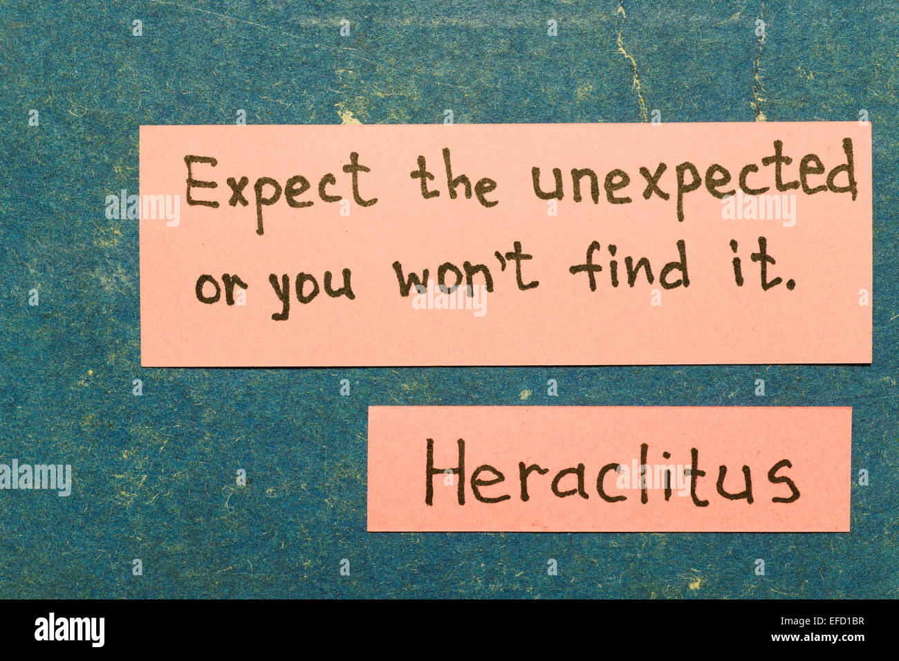 expect the unexpected, or you won't find it - ancient Greek philosopher Heraclitus quote interpretation with pink notes on vinta Stock Photo