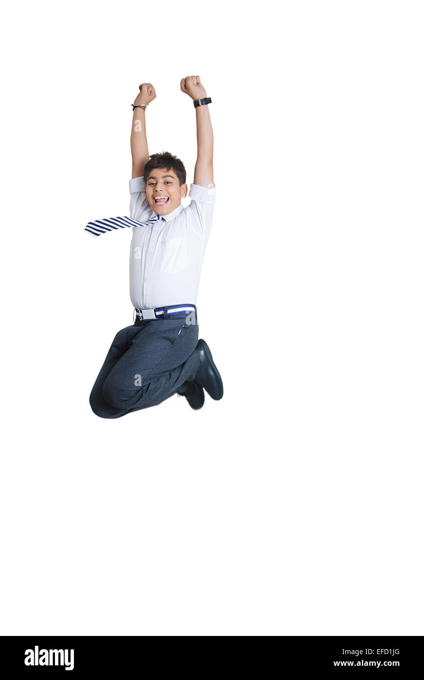 Indian boy school student jumping hires stock photography and images