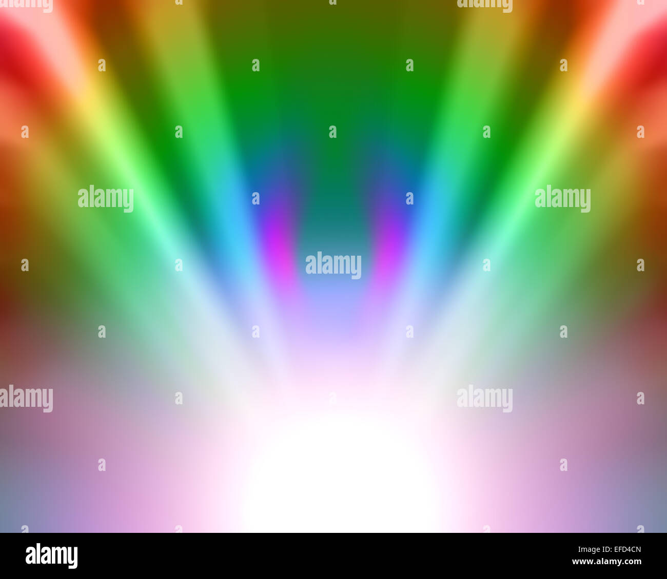 A 'fun' image of multicolored light emerging from a white center. Use as background for disco, party or ceremony articles Stock Photo