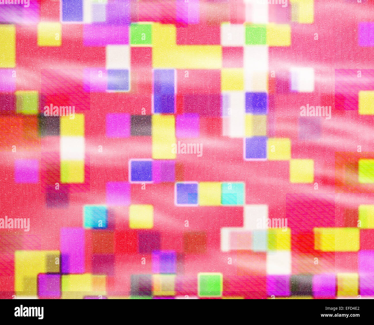 An unusual background image consisting of colored squares on a patterned background suggesting wrapping paper etc. Stock Photo