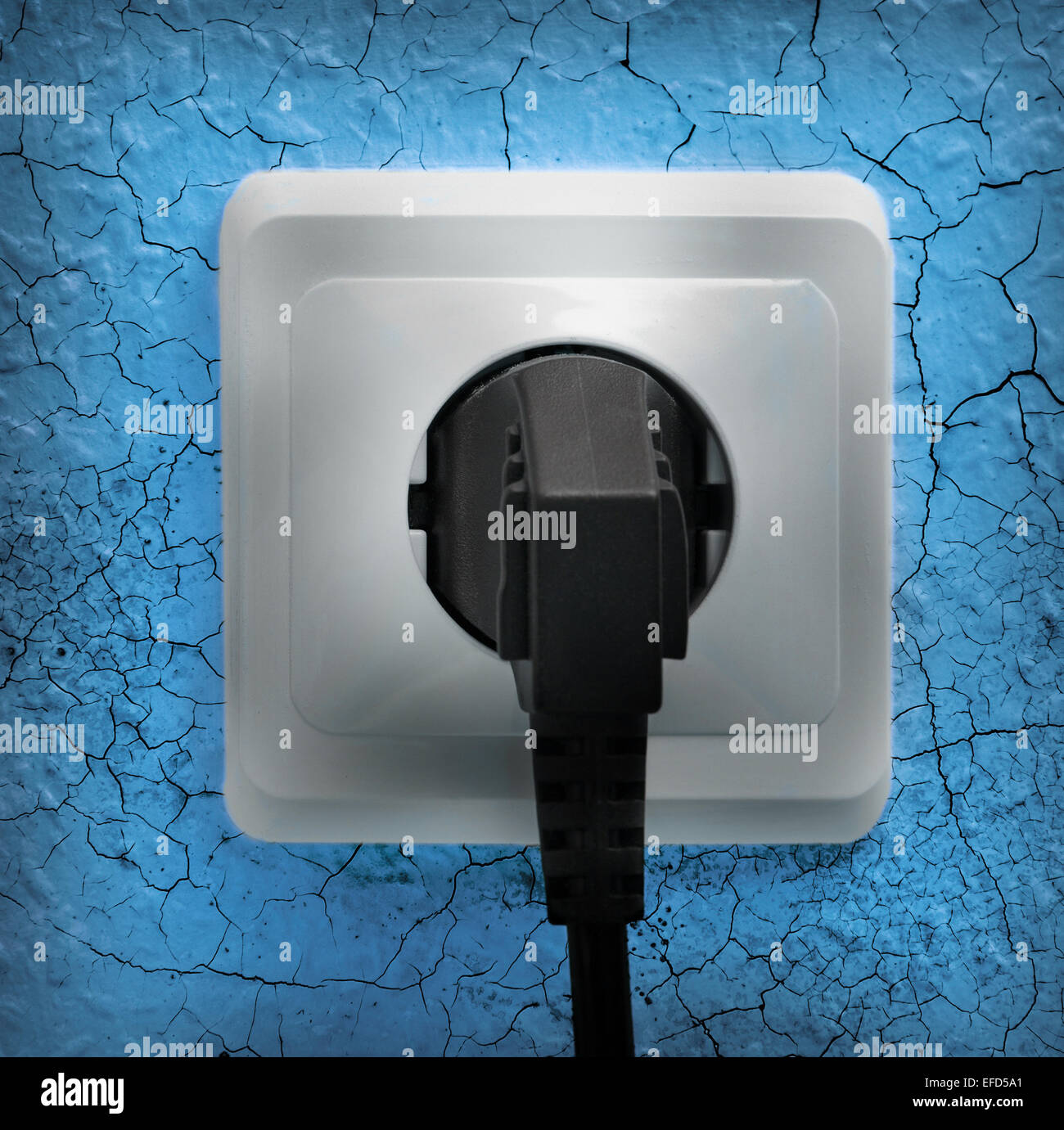 Wall plug socket on cracked colored wall background Stock Photo Alamy