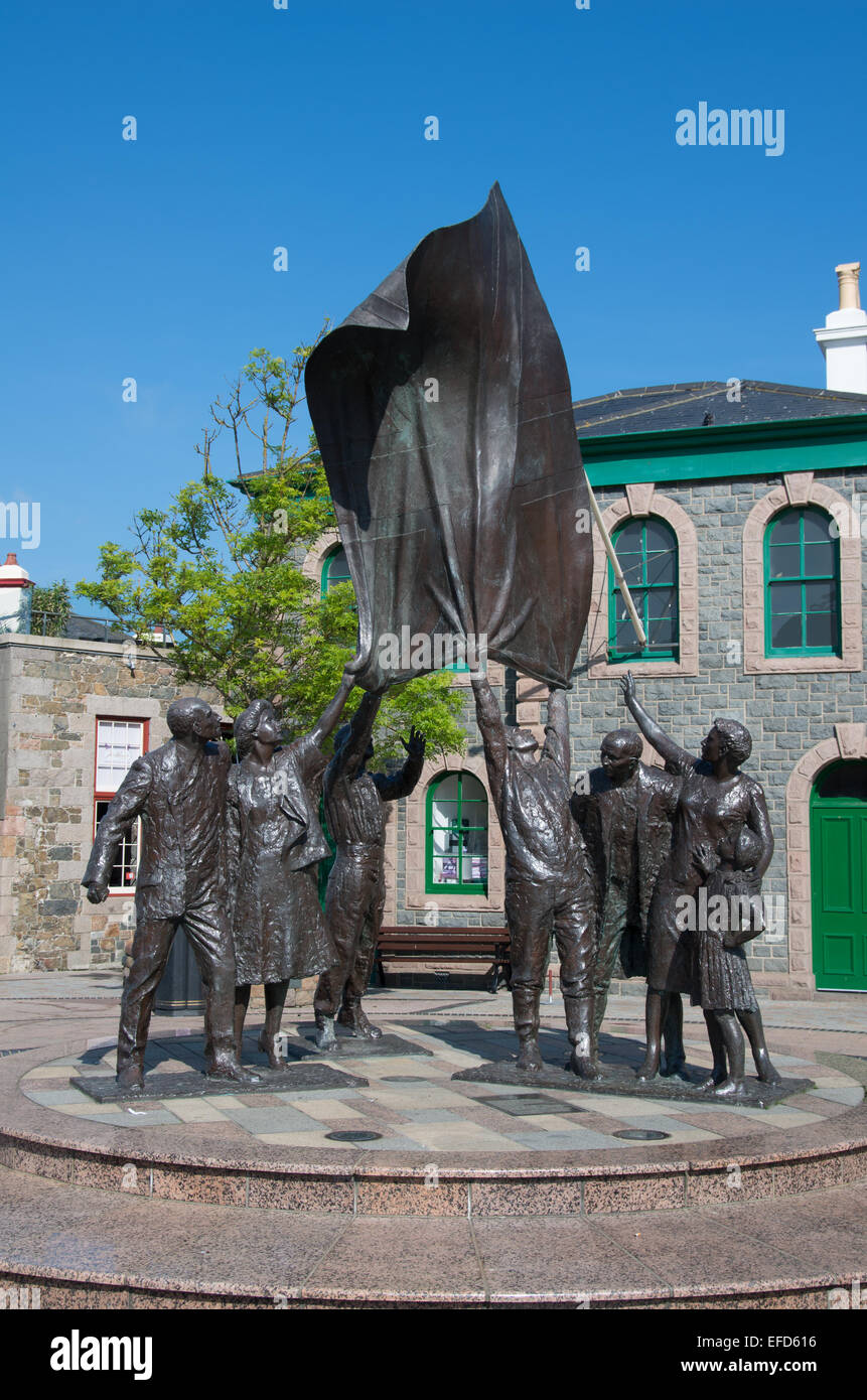 A sculpture by Philip Jackson unveiled in 1995 in Liberation Square, Jersey. Stock Photo