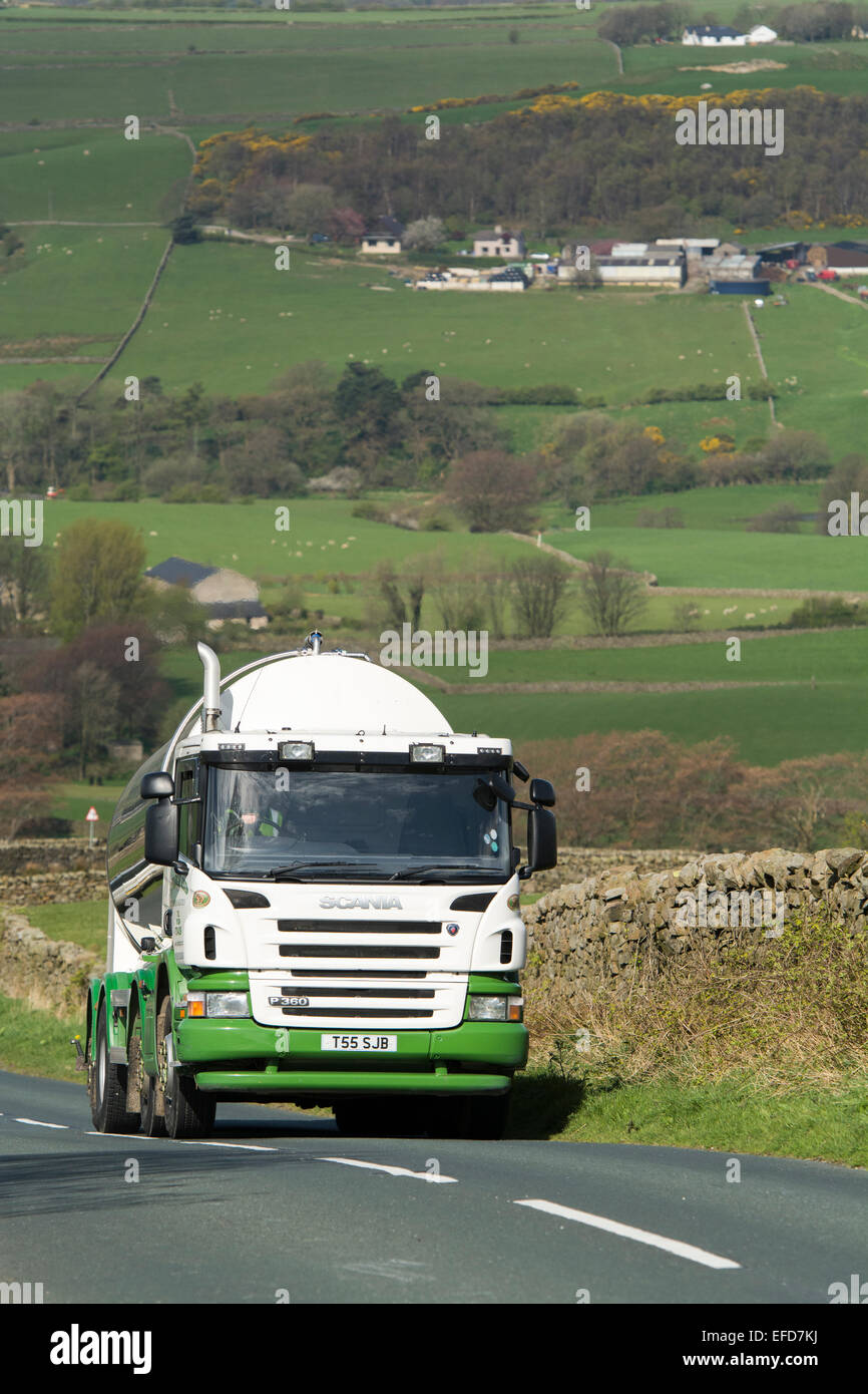 Milk tanker on its rounds collecting milk from dairy farms, Lancashire, UK Stock Photo