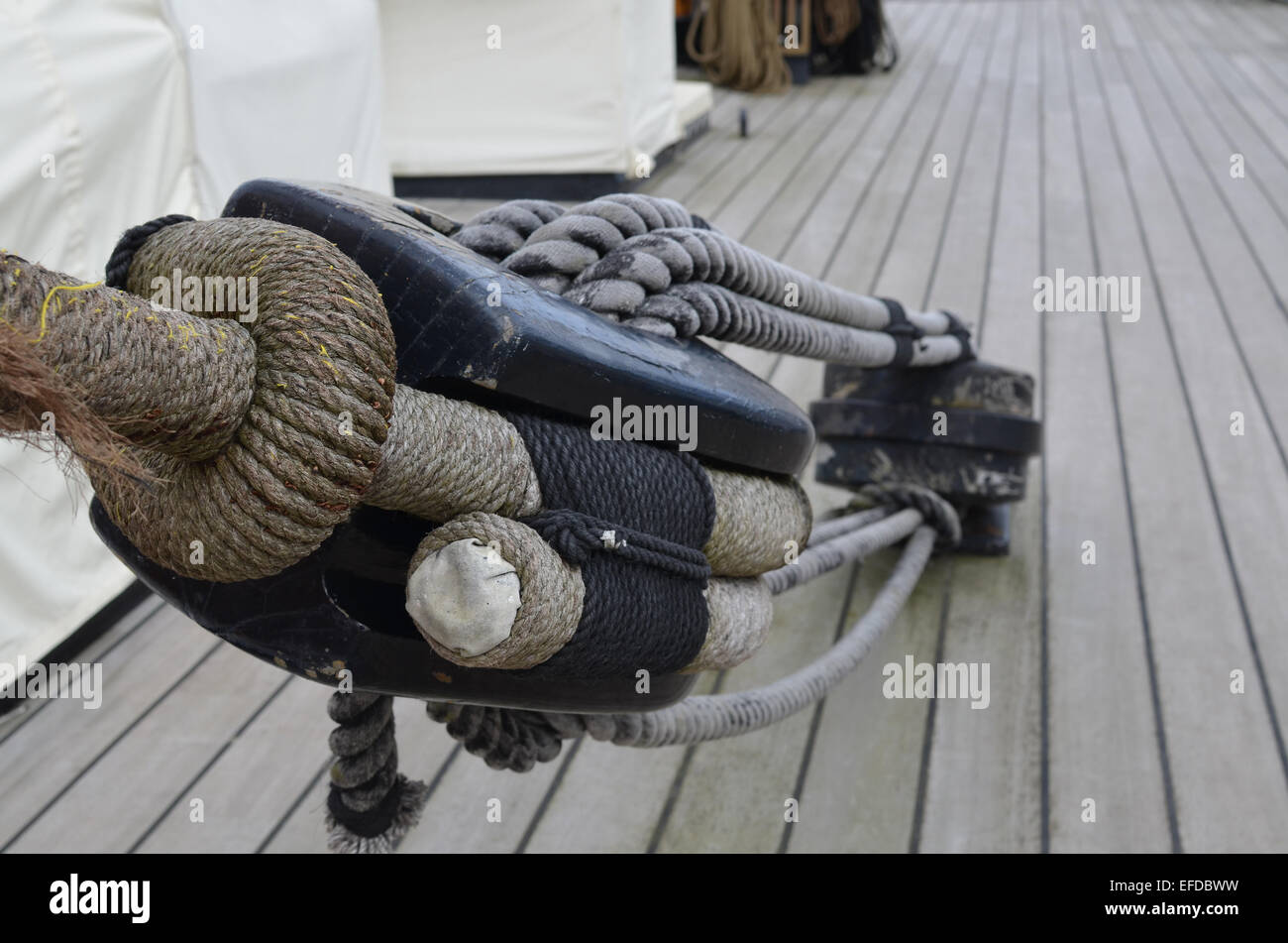 Large rigging block and tackle on the deck of a sailing ship Stock