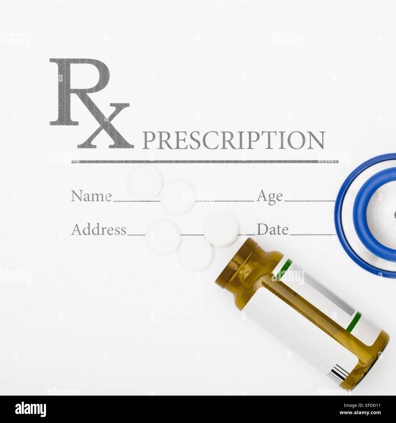 Medical prescription and pills and stethoscope on table - studio shot ...
