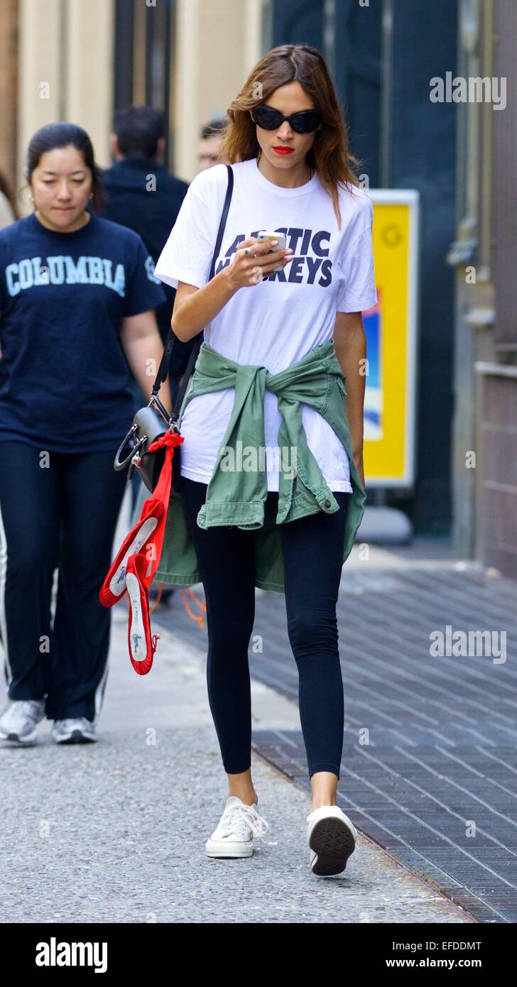 A dressed down Alexa Chung, wearing an Arctic Monkeys T-shirt, out and about in East Village. Chung dated the lead singer of the band, Alex Turner, for four before